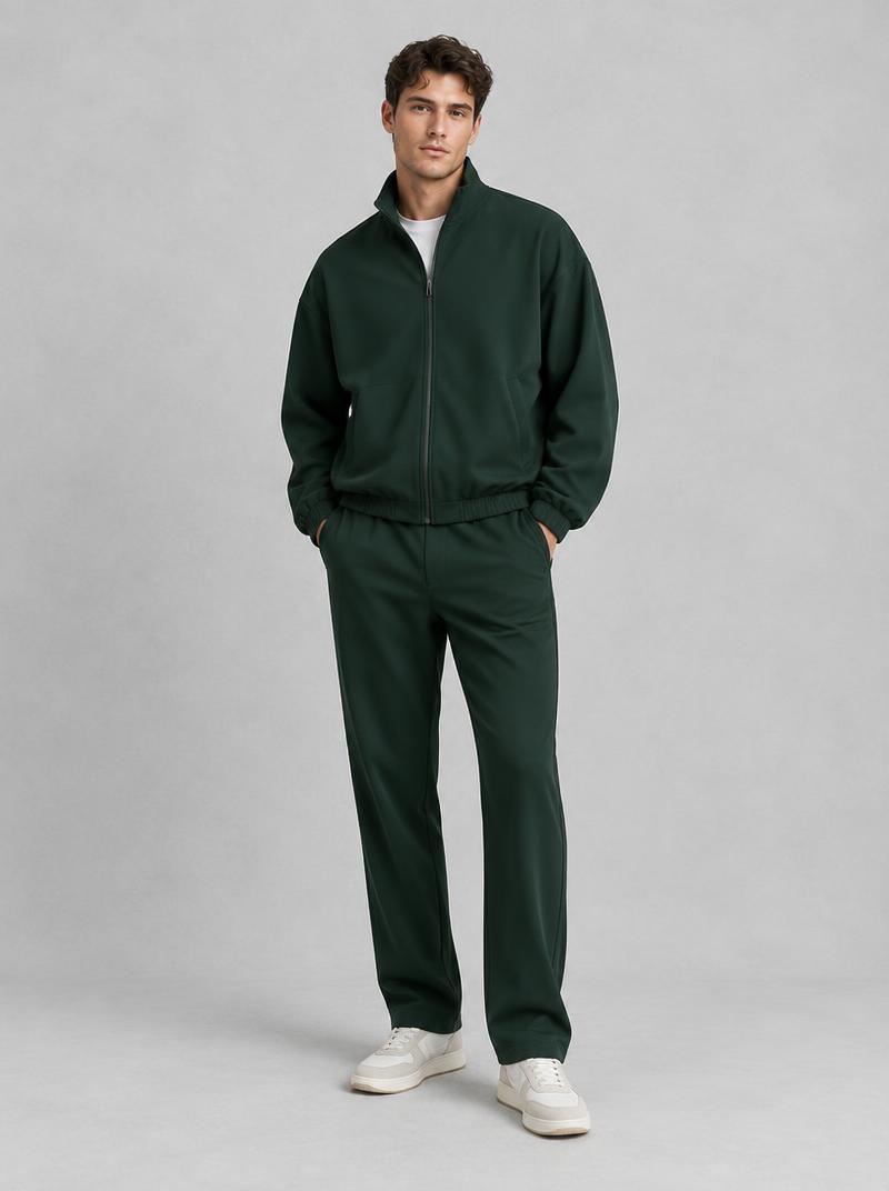 Deep forest tracksuit with brushed metal zip in motion